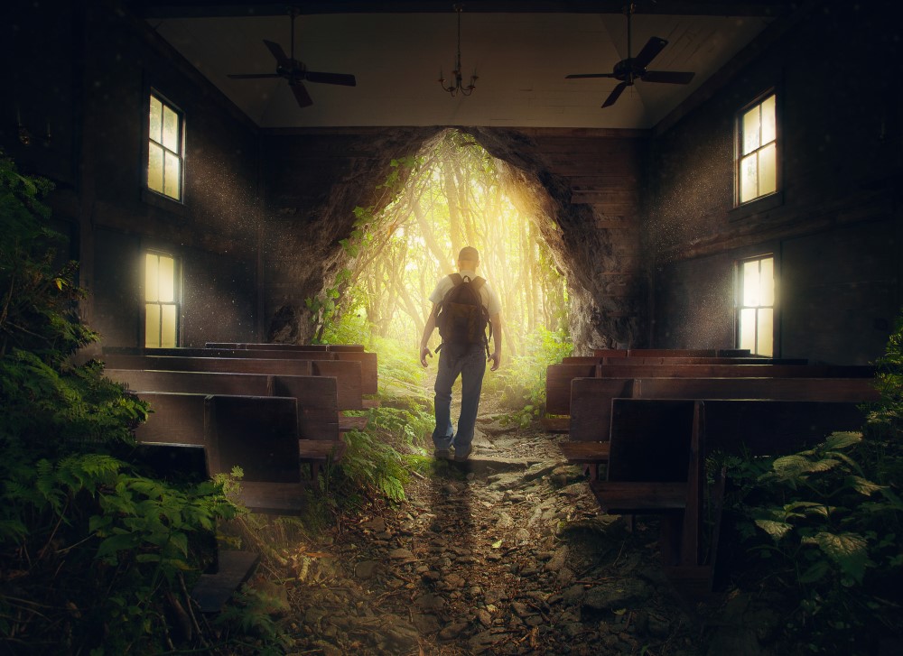 a-man-leaves-from-an-empty-church-in-the-forest_medium